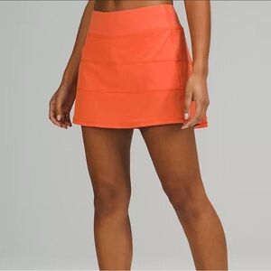 Lululemon orange pace rival skirt 12”